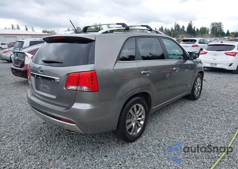 2012 Kia Sorento Sx V6 z USA, uszkodzony, nr VIN 5XYKWDA28CG281834